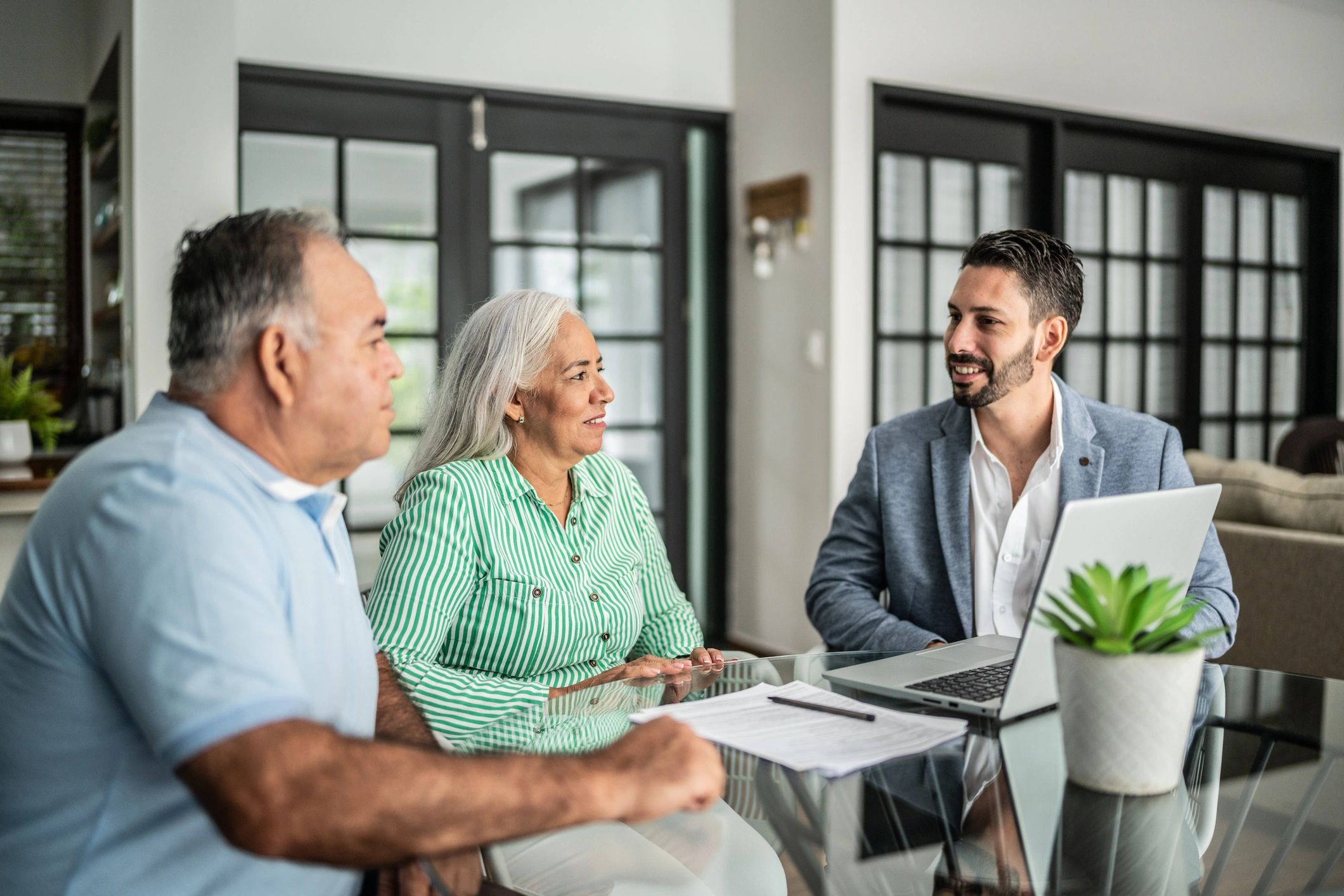 Advisor meeting with clients to discuss exchange planning